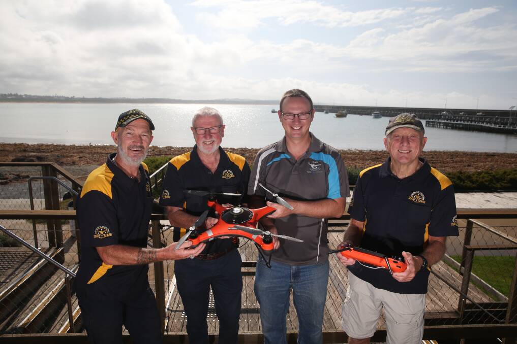 PIONEERS: Drone specialist Mathew Herbert and Warrnambool Coast Guard members David Francis, Allan Wood and Keith Prest. Picture: Mark Witte