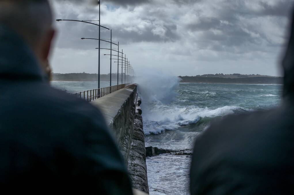 STORMY SUNDAY: Waves hit the Warrnambool breakwater. Picture: Chris Doheny