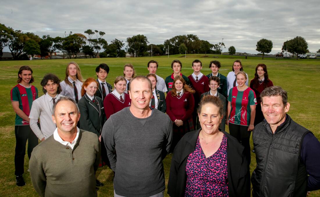 ALL SMILES: Brauer College teacher Iain Jackson, legacy representative Matt Porter, Kate Lindsey from the Warrnambool Racing Club and careers advisor Jonathan Jenkins celebrate with students. Picture: Chris Doheny