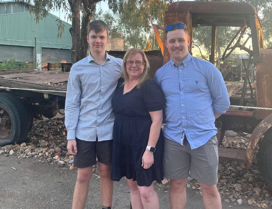 Jo Halliwell, centre, travelled to Alice Springs with her sons Thomas and Michael for the ceremony.