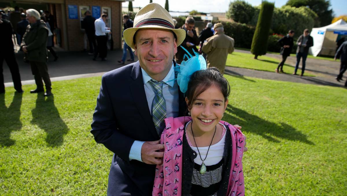 Tommie Conway, of Fairfield, and his daughter Clody Conway, 8, are hoping for a winner with their horse Maxey Campo. Picture: Rob Gunstone