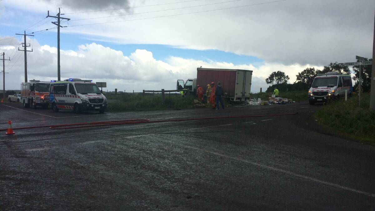 ROAD CLOSED: Debris was scattered on the road following the accident between two trucks.