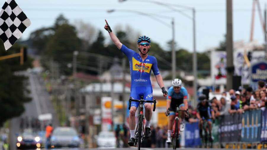 NUMBER ONE: Nathan Elliott celebrates crossing the finish line in first place. Picture: Rob Gunstone