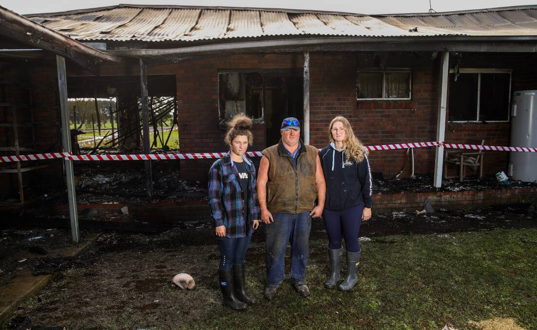 LUCKY: Leah Dickson, 16, Bryan Dickson and Jacque Dickson, 19, survey the damage to their Garvoc home. Picture: Morgan Hancock