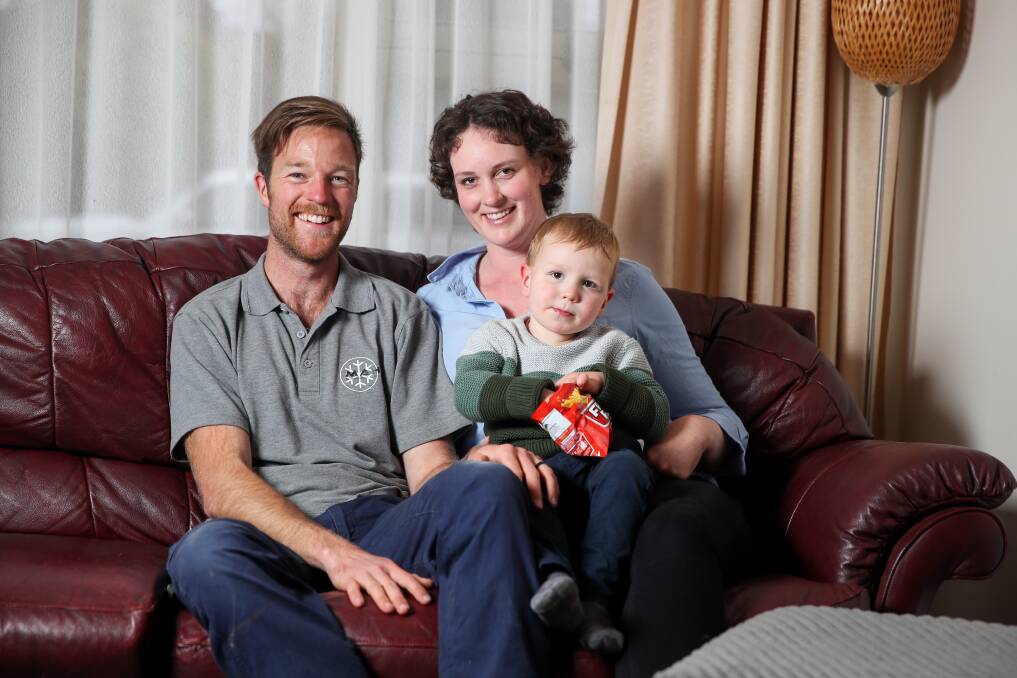 ALL SMILES: Emma O'Neill celebrates being cancer free with her husband Tom and son Max, 2. Picture: Morgan Hancock