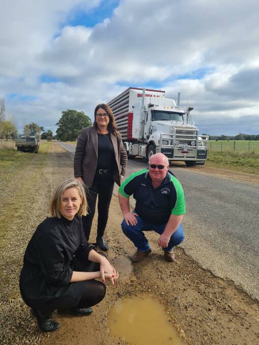 CONCERNING: Steph Ryan and Roma Britnell took a look at the Woolsthorpe-Heywood Road with truck driver Peter Shiells recently.