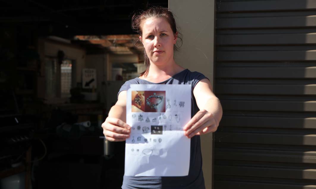 UNHAPPY: Shanae Hyder holds a piece of paper with the jewellery items stolen from her garage on Saturday. The jewellery was worth more than $9000.