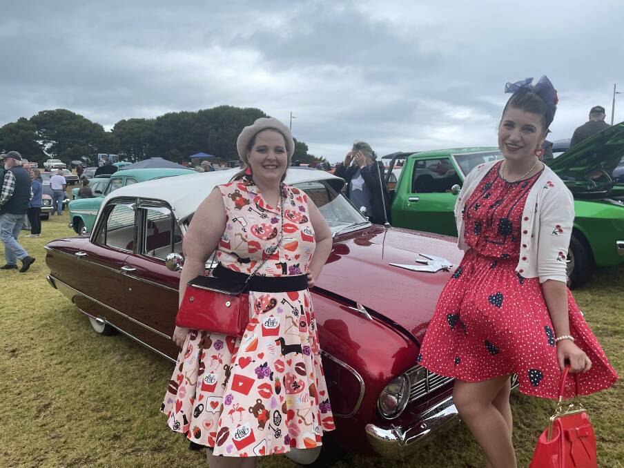 Bendigo's Amanda Downing and Pakenham's Tara Snelling check out a 1960 Ford XK at the event.
