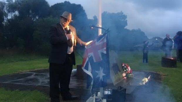 Yambuk's only local-born veteran, Mick Cain, officiates at the village's first dawn service. Photo: Tony Wright