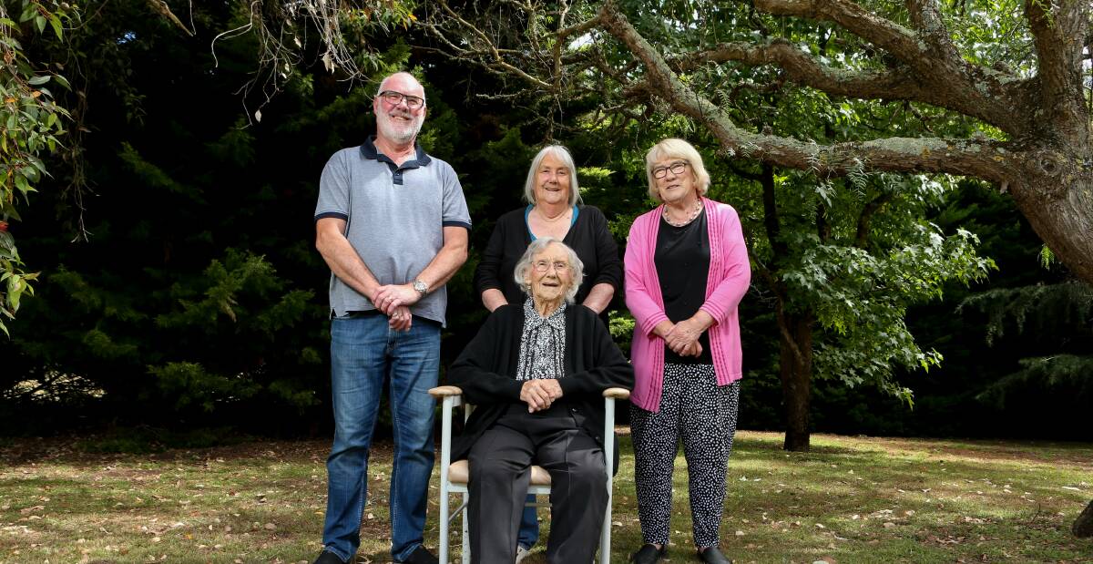 FIGHTING FIT: Jean Nicolson, with her son Tony and daughters Sandra Hackett and Carolyn Henderson, remains living at the property she spent most of her life with her late husband Keith on. Picture: Chris Doheny