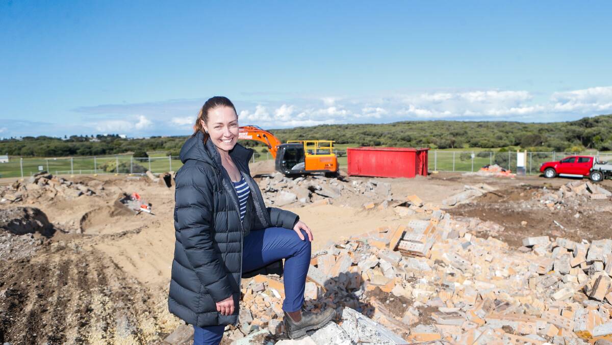 END OF AN ERA: Warrnambool Golf Club manager Ashlee Scott stands in front of the former clubrooms, which have been demolished to make way for a new facility. Picture: Anthony Brady