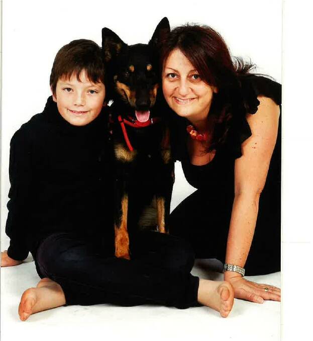HAPPY FAMILY: Jenny Lo Ricco with her son Noah, who is now 18, and their dog Scout. She hopes to help others learn how to face their pain.