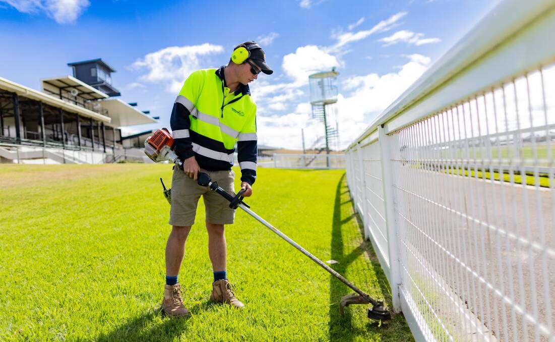 Mitchell O'Neill does his bit to ensure the Warrnambool Racing Club is looking good ahead of the May Racing Carnival. Picture by Anthony Brady