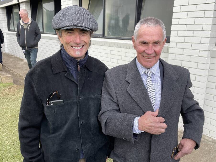 ALL SMILES: Former jockeys Brian Luke and Neville Wilson catch up at the Warrnambool racecourse.