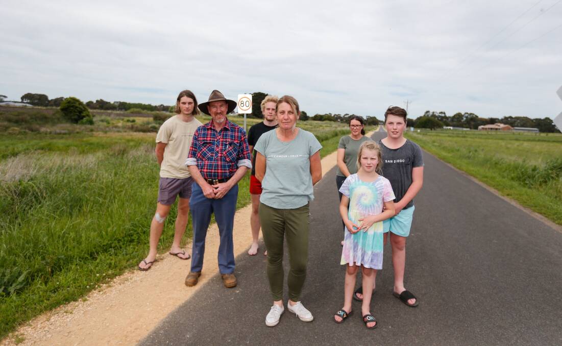 HEARTFELT PLEA: Allansford residents, including Vicki Burns (front), want a speed limit reduction on Carrolls Road. Picture: Anthony Brady