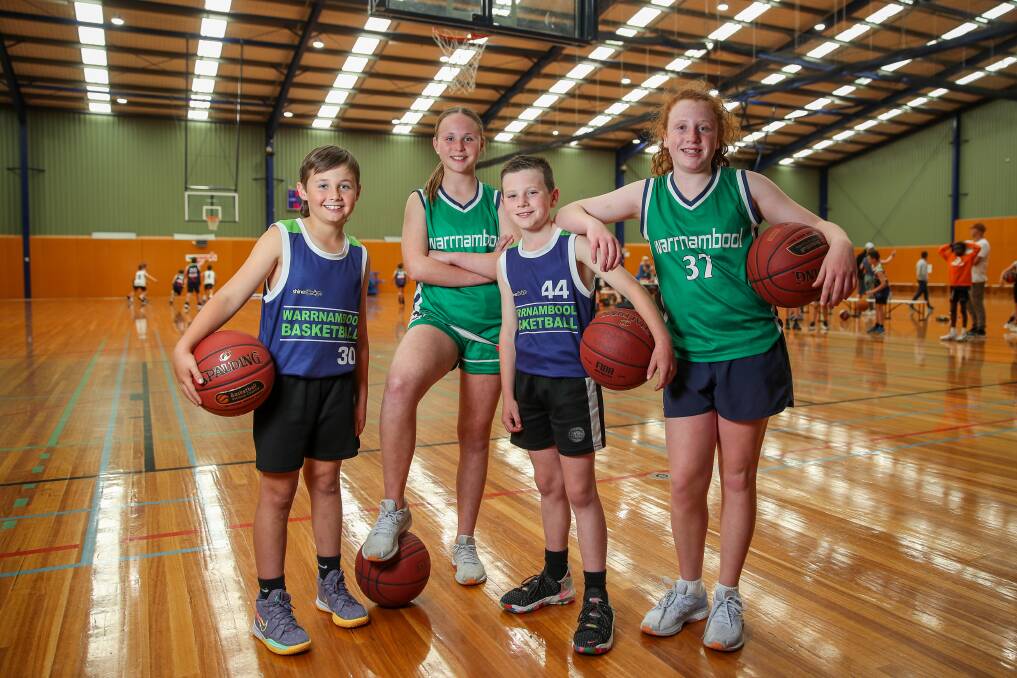 WELCOME CHANGE: Warrnambool Basketball Incorporated players Oliver Marris, 10, Stella Marris, 12, Ned Bowman, 10 and Rosie Bowman, 12 are all smiles. Picture: Morgan Hancock