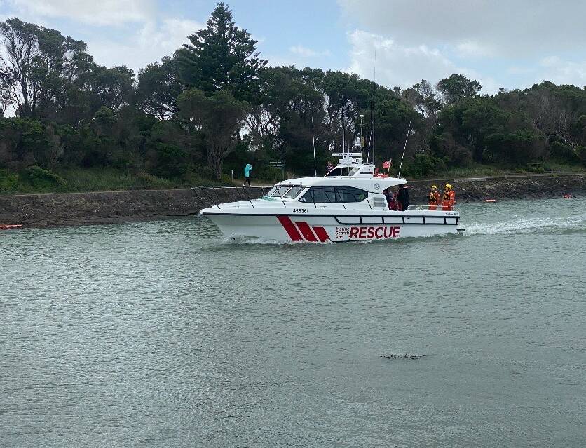 RESCUE: The Ballarat family was taken to safety by the Port Fairy Marine Rescue Service boat.