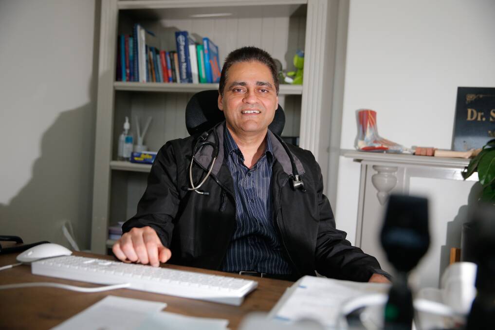 CONCERNED: Dr Surinder Singh in his office at the King Street Medical Centre