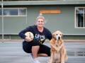 MILESTONE: Sarah O'Meara, with her dog Tyson, will play her 250th game for North Warrnambool on Saturday. Picture: Anthony Brady