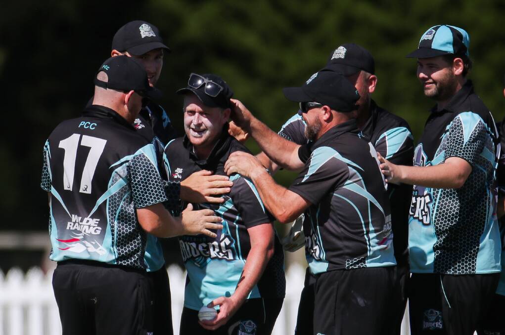 CELEBATION: Northern Raiders players celebrate their win against Koroit in this year's division two grand final. 