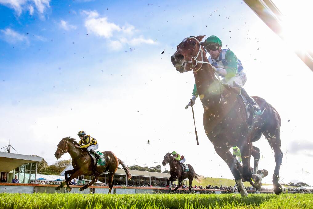 ACTION AT THE TRACK: Horses compete in race seven on day two of the May Racing Carnival. Picture: Morgan Hancock