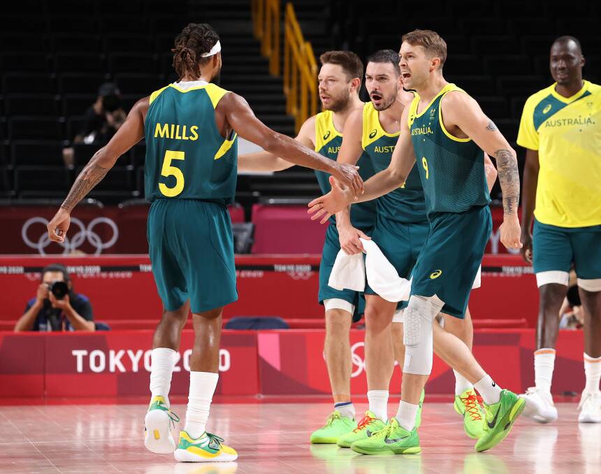 YES! Nathan Sobey celebrates with teammate Patty Mills. Picture: Getty Images