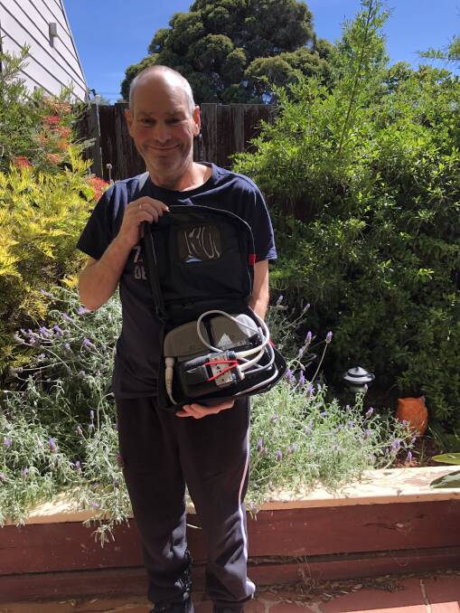 RECOVERING: Darryl Knowles with his VAD machine at his sister's home in Laverton. Picture: Supplied
