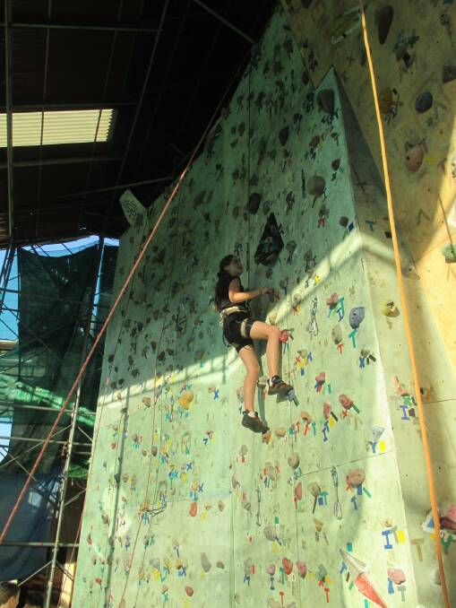 ADVENTURE WALL: Gabby Lougheed, Paul Lougheed's daughter, climbs the former rock wall.