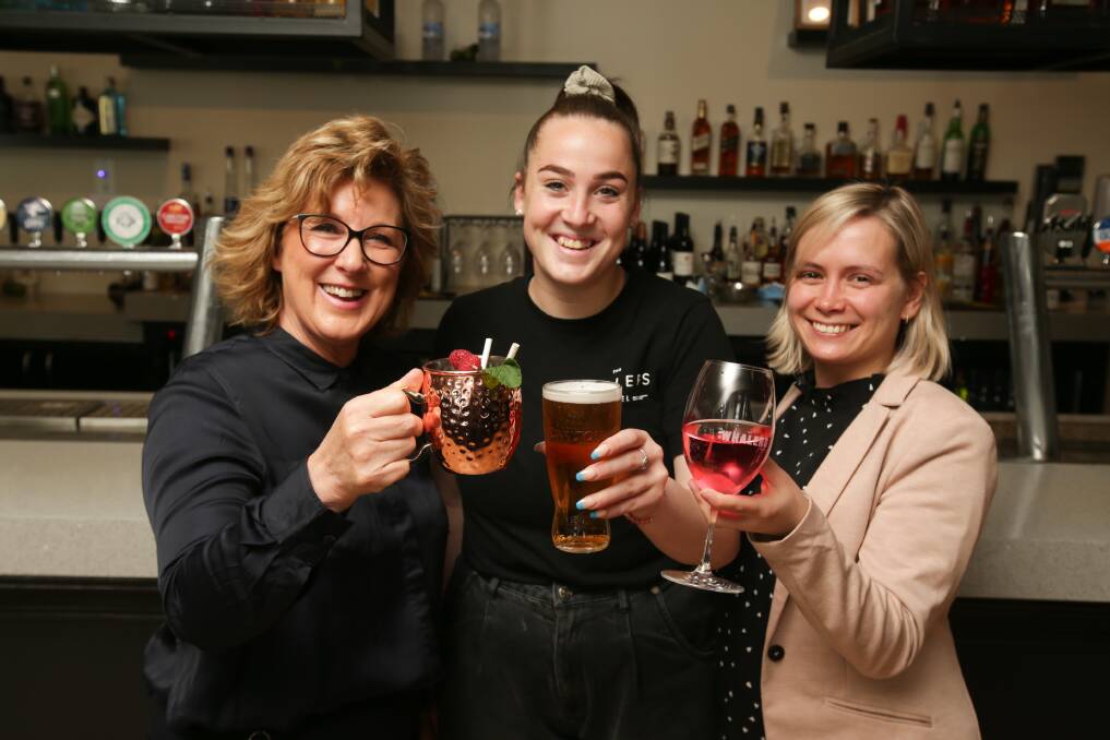 CHEERS: The Whalers Hotel owner Susie Porter with staff members Sarah Oliver and Andrea Zurowski celebrate ahead of Friday night. Picture: Chris Doheny