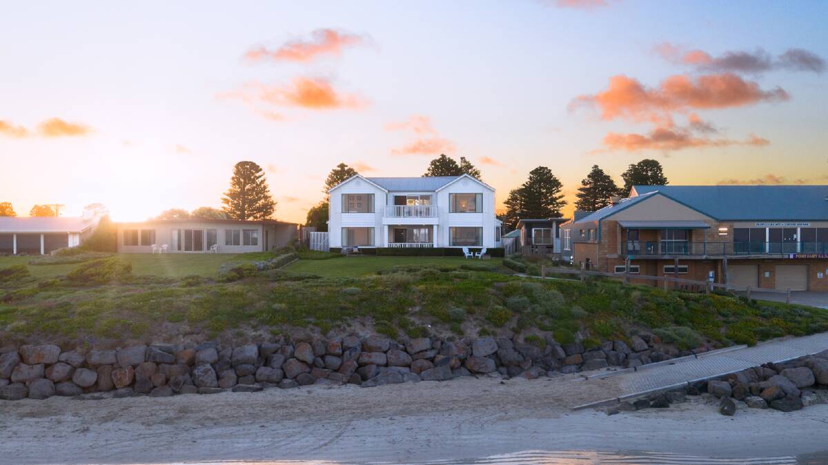 LOCATION, LOCATION: The stunning six-bedroom home offers beach frontage and sweeping views.