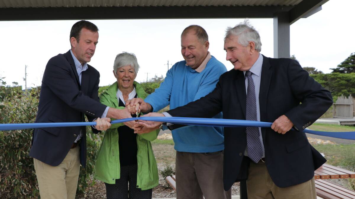 Member for Wannon Dan Tehan, left, with Moyne Shire mayor Ian Smith, right, opens the new space with community members Jenny Porteous and Ron Irvine.
