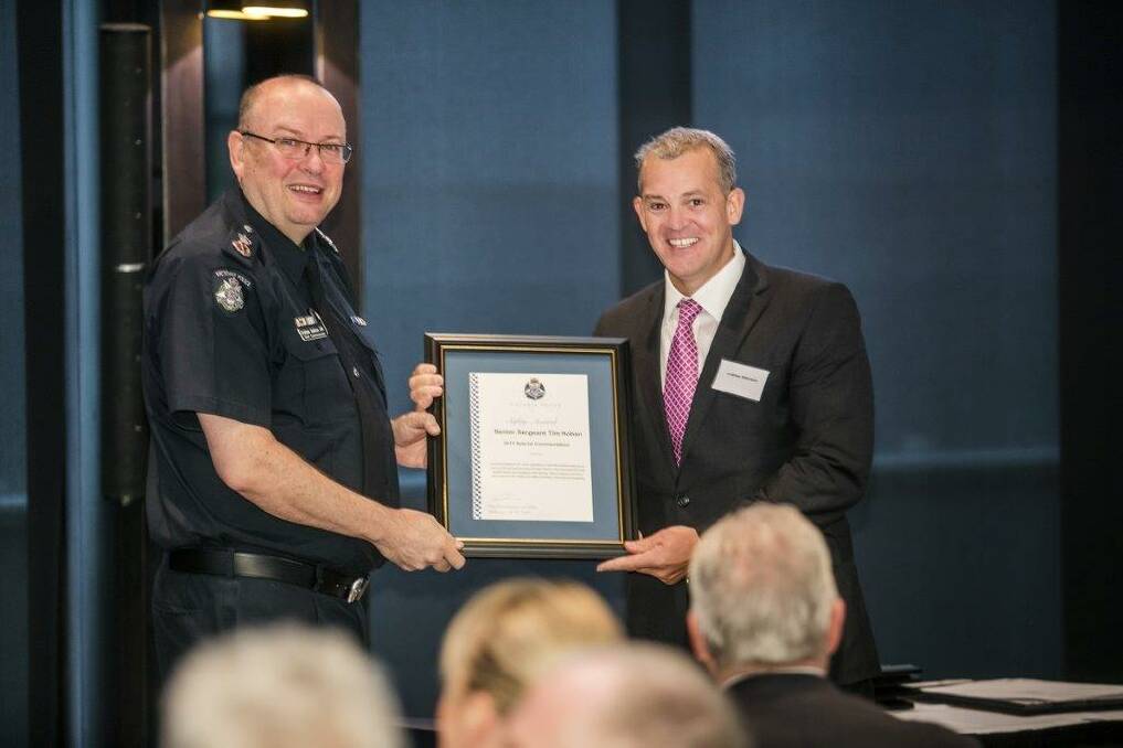 PROUD MOMENT: Andrew Atkinson, right, with Victoria Police Chief Commissioner Graham Ashton.