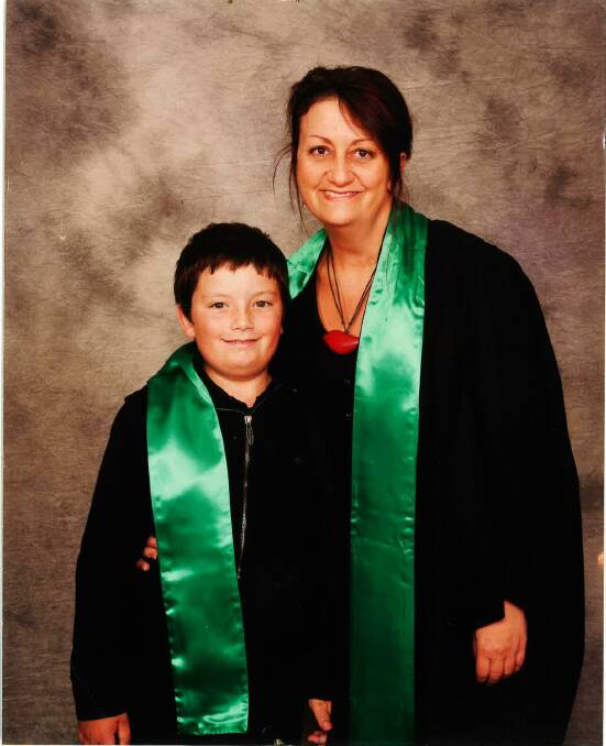 BELOW: Jenny Lo Ricco at her graduation ceremony with her son Noah. She is a former nurse and qualified Bowen therapist and lymphatic practitioner.