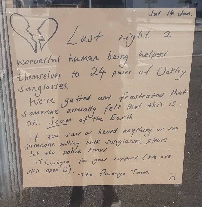 The owners of The Passage expressed their disappointment in a sign on the window of the shop.