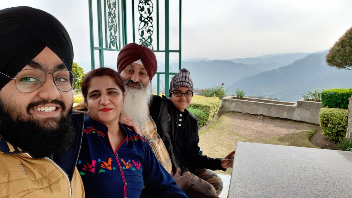FAMILY: Deakin University nursing student Gurattan Singh with his parents Satwinder and Karamjit and younger brother Harrattan, 11, back home in India.