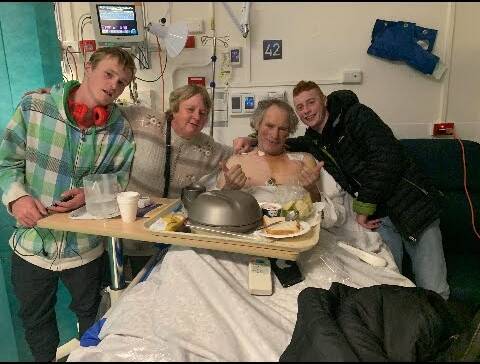 FAMILY: Darryl Knowles is visited in hospital by wife Joanne and sons Fred and Thomas. Picture: Supplied