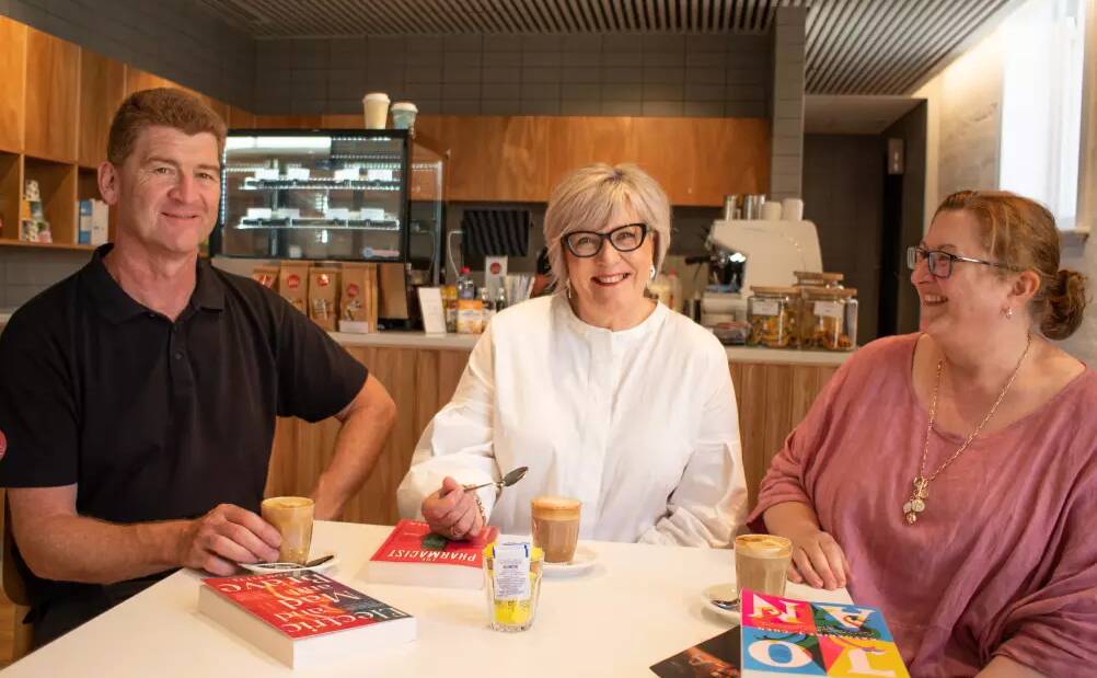 Warrnambool councillor Debbie Arnott, centre, celebrates the opening of the library cafe with Steve Weber and Maree Wyse from Tasty Plate after the opening. Picture supplied