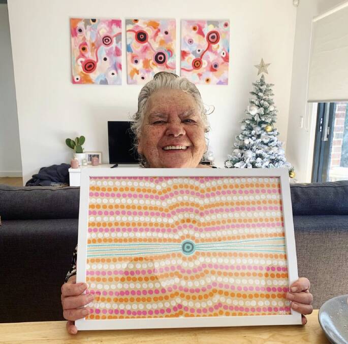 PROUD: Bayley's grandmother Maude Mifsud, with a piece of her granddaughter's artwork.