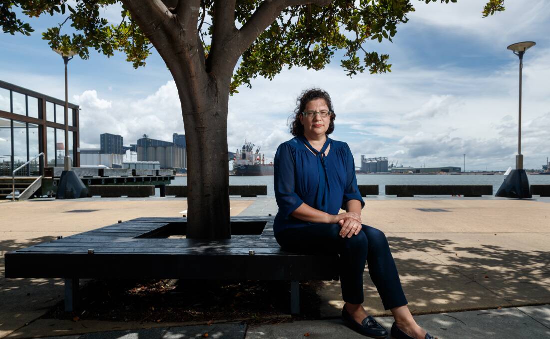 Trade Tensions: Professor Lisa Toohey, with Newcastle Port in the background, says belligerence "doesn't particularly help any cause". Picture: Pic Max Mason-Hubers 