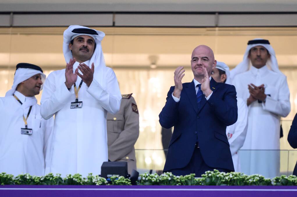 Qatar's Emir Sheikh Tamim bin Hamad al-Thani, left, with FIFA president Gianni Infantino at the World Cup. Picture Getty Images