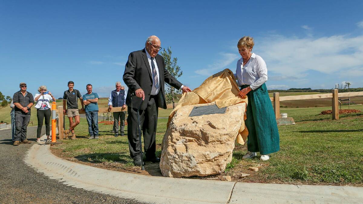 Open: Former long-time Warrnambool Cemetery Trust committeeman Jack Daffy and current chair Sheryl Nicolson unveil a plaque at the opening of the new cemetery in March last year. 