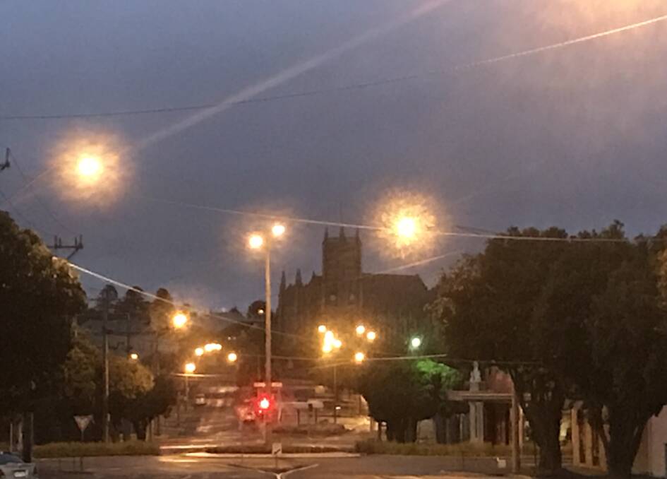Cloudy: It's very dark at 7am looking north in Warrnambool's Kepler Street at 7am. Today's top in the city will be 20 degrees.