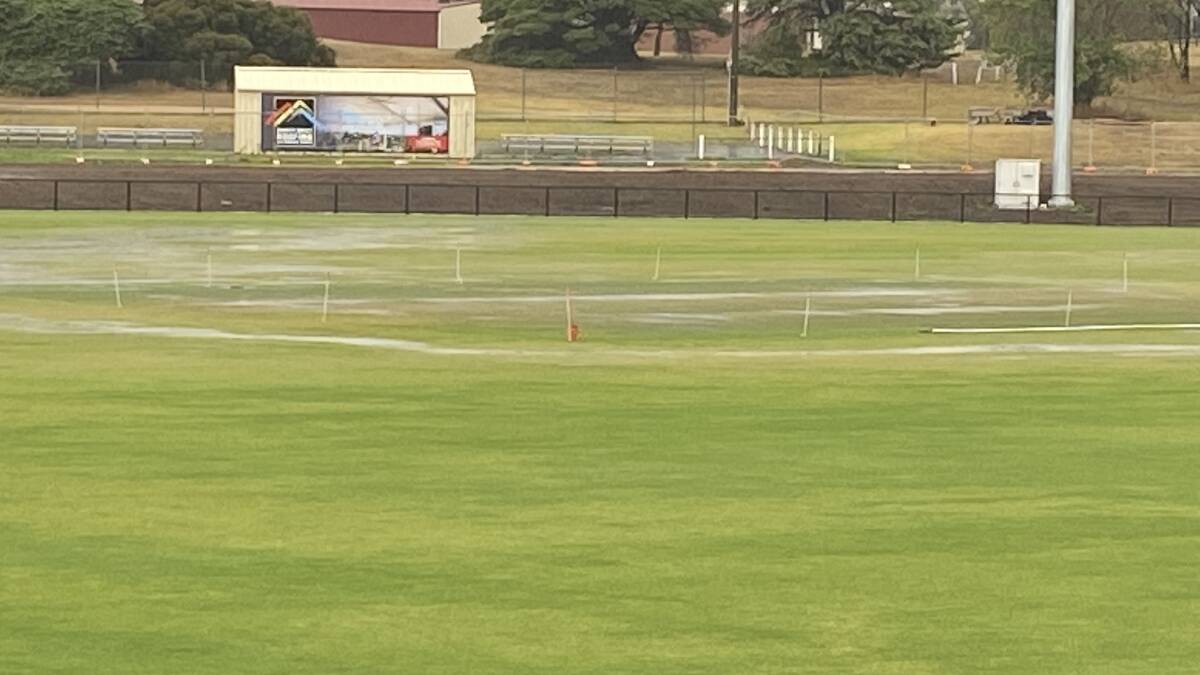 Problems?: Reid Oval at 5.30pm on Tuesday this week after 10mm of rain. The centre wicket and eastern wing were partially covered in water.