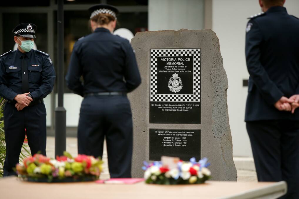Police members at the Gilles Street memorial site during last year's Warrnambool service.