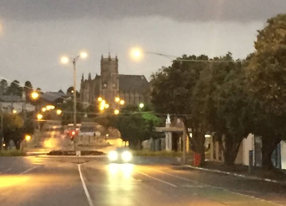 Gloomy: Warrnambool was still pretty dark just before 7am this morning looking north up Kepler Street. 