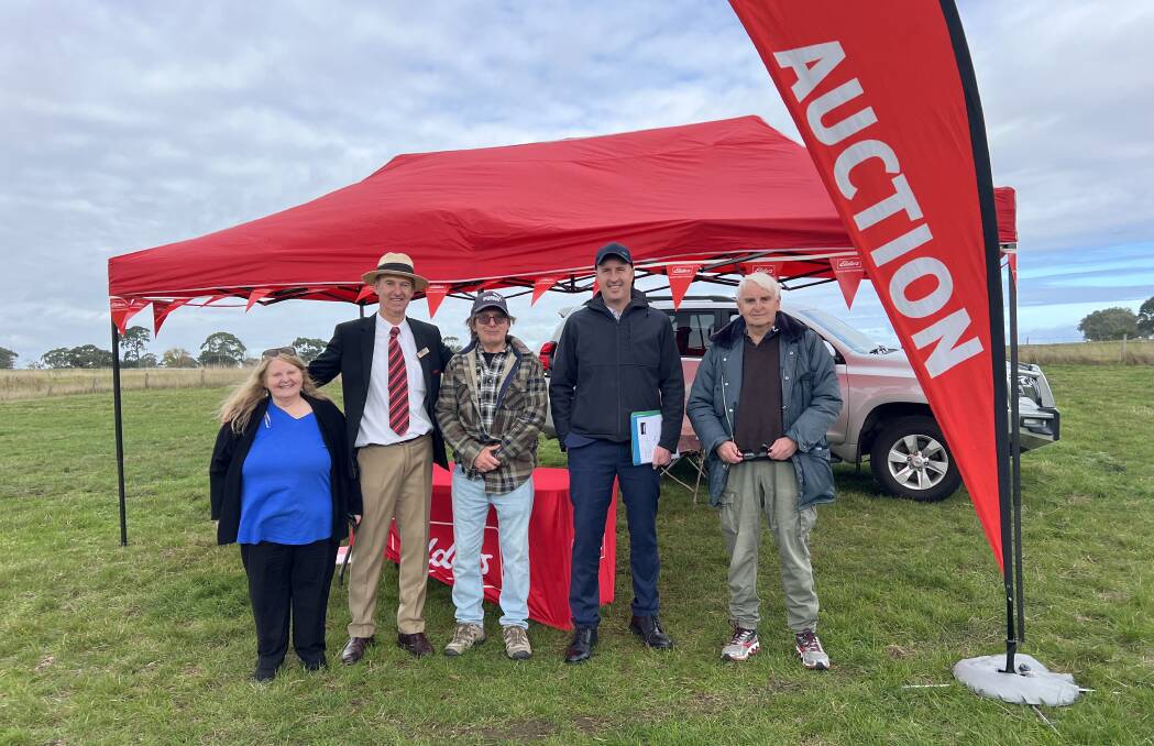 Elders agent Rob Rickard (second from left), with Chislett family solicitor Marcus Malseed (second from right) and Chislett family siblings Lynee, Don and Gary. They were all delighted with the sale price of $17,200 an acre.