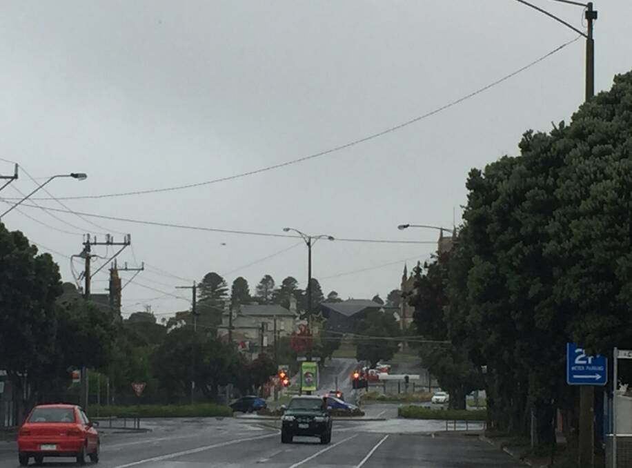 Drizzle on: Warrnambool down Kepler Street at 7am was a bit gloomy but it will brighten up duing the dfay.