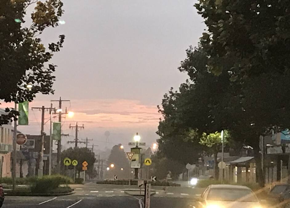 Foggy start: Looking east along Warrnambool's Lava Street at 7am. You could only just see the silver ball. Warrnambool is expecting a top of 20 degrees