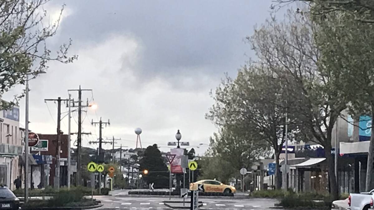 Grey day: Looking east down Lava Street just before 7am in Warrnambool.