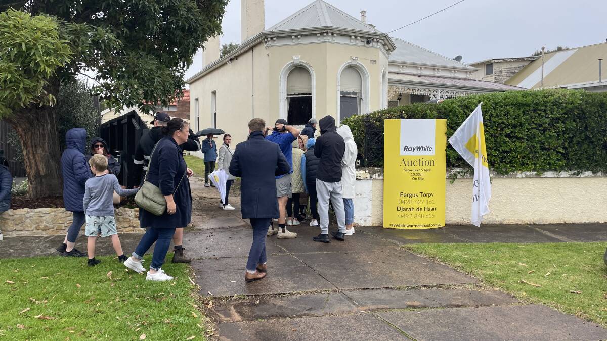 About 60 people attended the Saturday morning auction of No. 4 Howard Street. The home sold for $765,000.